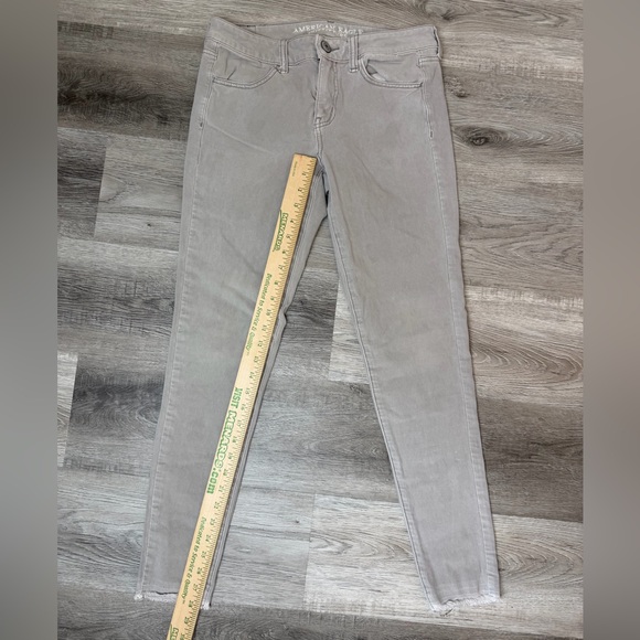 American Eagle Jegging 360° Super Stretch Raw Hem Jeans Size 8 Long - Picture 5 of 9